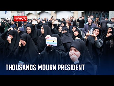 Thousands mourn Iran's president and others celebrate his death