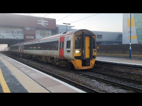 Class 158 departs Birmingham International Station