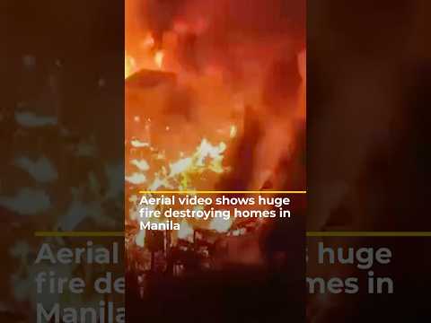 Aerial video shows major fire ripping through homes in Manila | AJ#shorts
