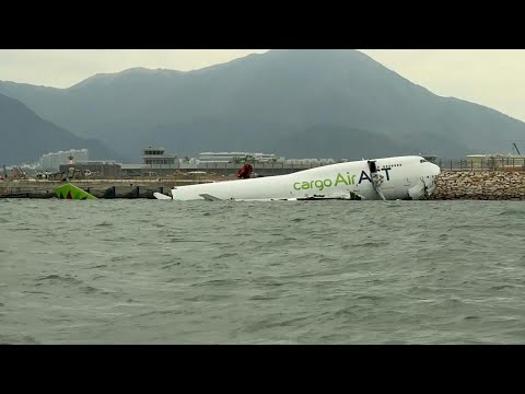 Cargo plane in sea after skidding off runway in Hong Kong | AFP