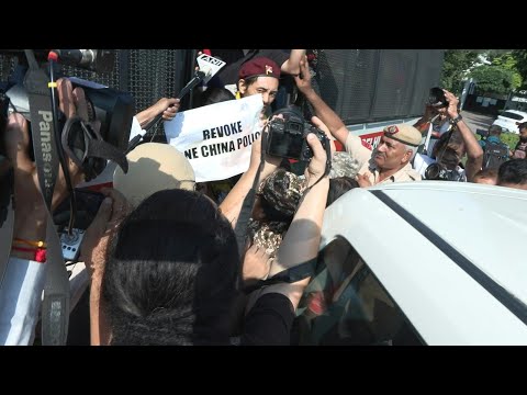 Tibetan activists protest against Chinese FM Wang Yi's visit to India | AFP