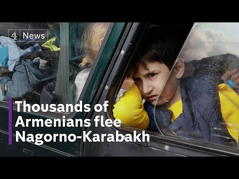 Thousands of ethnic Armenians flee as Azerbaijan forces seize control