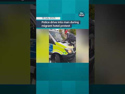 Police drive into man during migrant hotel protest