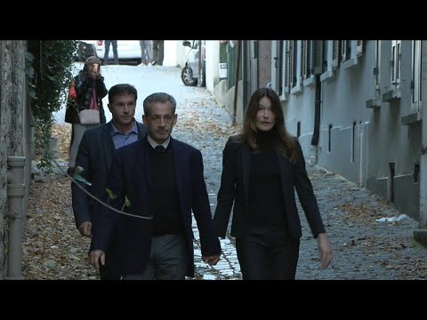 Sarkozy leaves home for La Sante prison, cheered by supporters | AFP