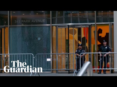 Bullet holes in Manhattan skyscraper after shooting kills four people