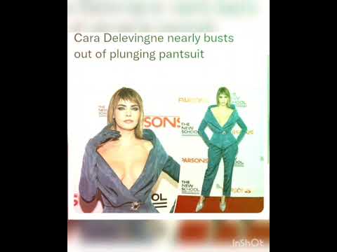 Cara Delevingne nearly busts out of plunging pantsuit