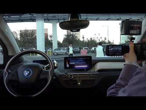 CES 2015 First Look: BMW Self Driving i3 Electric Car at CES 2015 - Autonomous demonstration - UCymYq4Piq0BrhnM18aQzTlg