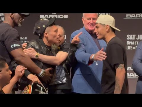 PITBULL CRUZ RESTRAINED AT FIERRO FACE OFF; GOES NOSE-TO-NOSE AND GETS PHYSICAL BEFORE REMATCH