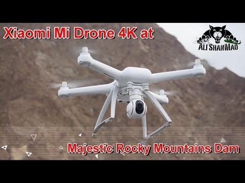 Mi Drone 4K Tall Rocky Mountains and Dam - UCsFctXdFnbeoKpLefdEloEQ