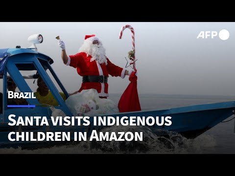 Santa visits indigenous children in Brazilian Amazon community | AFP