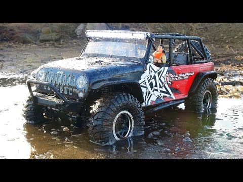 RC ADVENTURES - JEEP iCE DRiFTiNG - Axial SCX10 4x4 goes for a Swim - UCxcjVHL-2o3D6Q9esu05a1Q