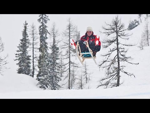 Eddie "The Eagle" Sets Toboggan Jumping World Record! - UCblfuW_4rakIf2h6aqANefA