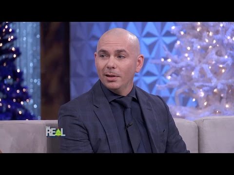 Pitbull Loves Strong Women, Pantsuits, and Making Education Sexy!