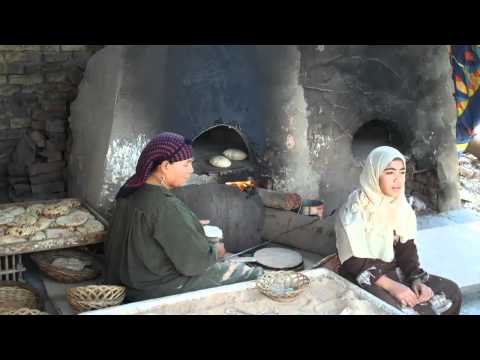 Making Arabic (Pita) Bread near the Giza Plateau Cairo, Egyp