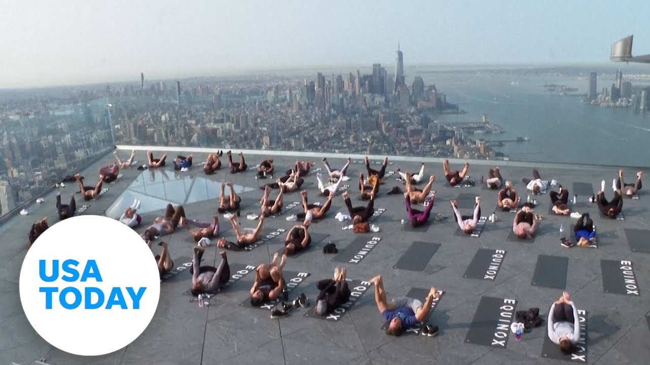 New York City fitness class brings yoga up 100 stories in the air | USA TODAY