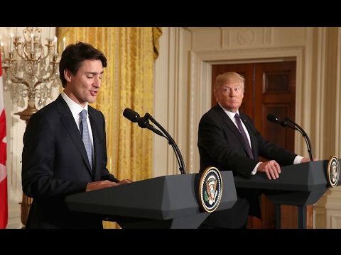 Trudeau reacts to Trump's travel ban during a joint conference - UCcyq283he07B7_KUX07mmtA