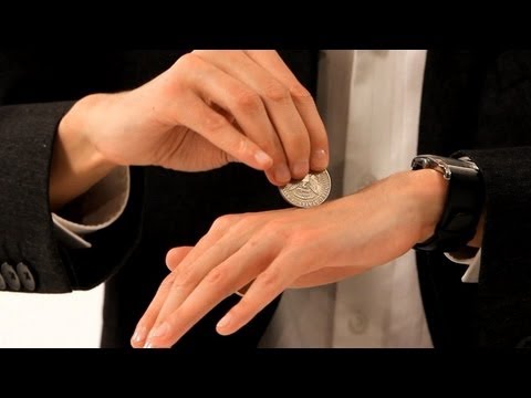 How to Pass a Coin through the Hand | Coin Tricks - UCSpVHeDGr9UbREhRca0qwsA