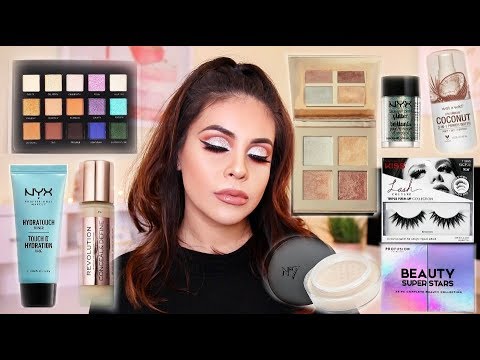 DRUGSTORE NEW YEARS EVE MAKEUP TUTORIAL: EASY GLITTER CUT CREASE! | JuicyJas - UCqTR5f7YkGro3cPv23SqcqQ