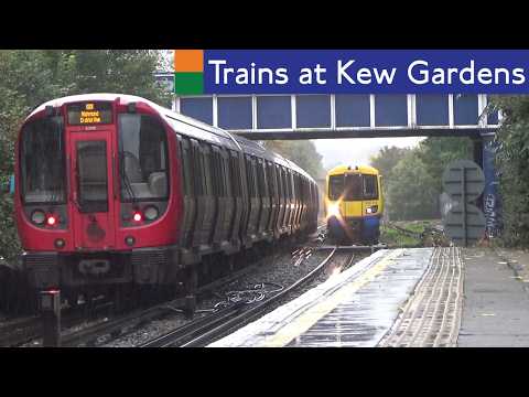 London Overground And District Line Trains At Kew Gardens