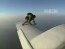 Man On The Wing Of a Plane