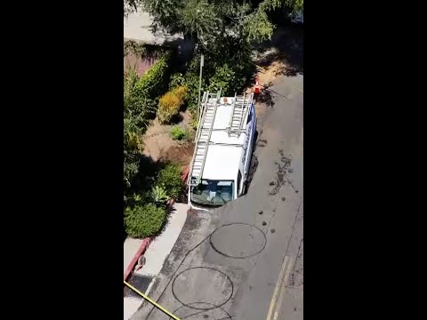 Giant sinkhole partially swallows Spectrum van