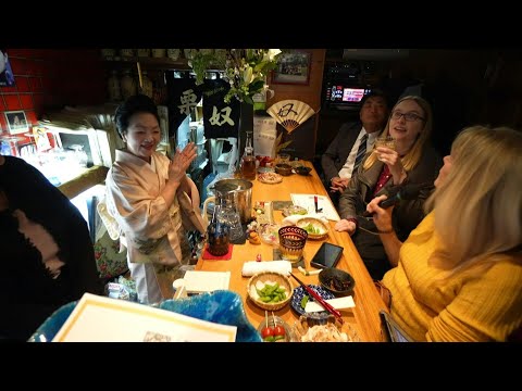 Tourists get taste of old Japan at hidden 'snack bars' | AFP