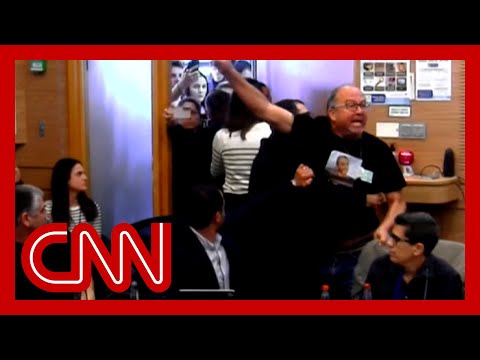 Family members of Hamas hostages storm into Israeli parliament