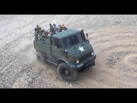 RC ADVENTURES - UNiMOG Log Ride w/ Bonus CYCLONE SCENE! - UCxcjVHL-2o3D6Q9esu05a1Q