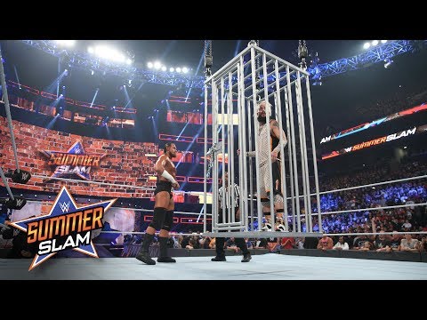 Enzo Amore is locked in a Shark Cage high above the ring: SummerSlam 2017 (WWE Network Exclusive) - UCJ5v_MCY6GNUBTO8-D3XoAg