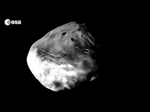 Mars Moon Phobos Fly-Around Created From Spacecraft Photos | Video - UCVTomc35agH1SM6kCKzwW_g