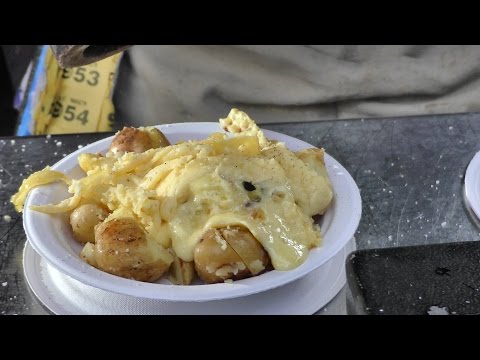 London Street Food. Preparing The Raclette of Melted Swiss Cheese. - UCdNO3SSyxVGqW-xKmIVv9pQ