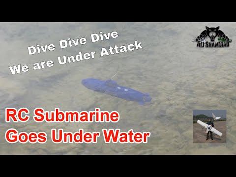 RC Submarine dives Under Water - UCsFctXdFnbeoKpLefdEloEQ