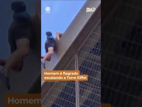 Homem é flagrado escalando a Torre Eiffel #shorts