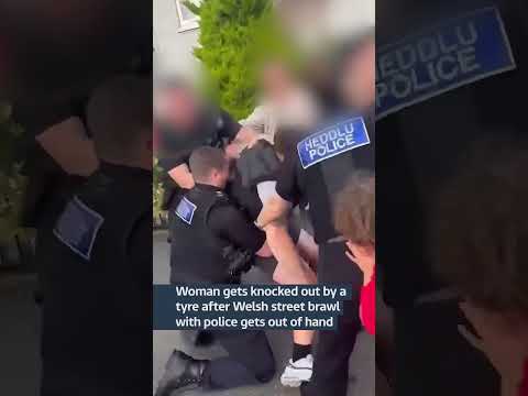 Viral brawl ends with woman being knocked out with a wheel #itvnews #news #uk #crime