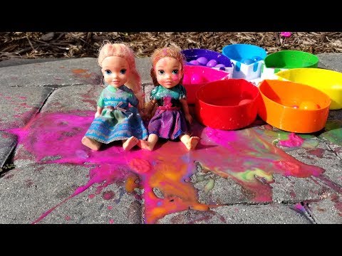Paintballs ! Elsa and Anna toddlers playing with colors - water fun - splash - UCQ00zWTLrgRQJUb8MHQg21A