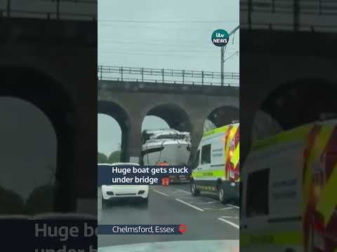 Huge boat gets stuck under bridge in Essex #itvnews