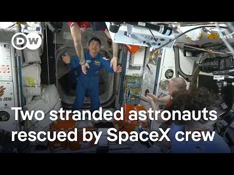 SpaceX capsule docks at Int'l Space Station, replacing two stranded NASA astronauts with new crew