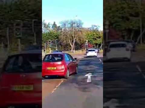 Car Driver in the Wrong lane Cuts across and stops at a green Light #DashCam #Shorts #Driving