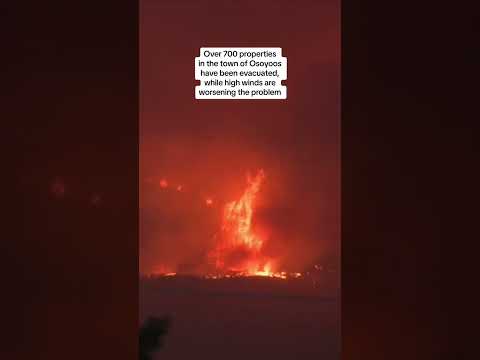 Wildfire rages in Canada after crossing US border