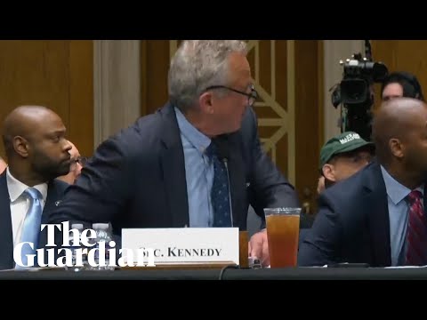 RFK jumps out of seat in shock as protesters disrupt committee hearing