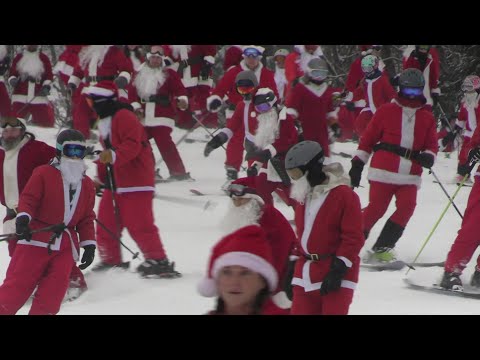 Hundreds of Santas ski in Maine to raise money | AFP