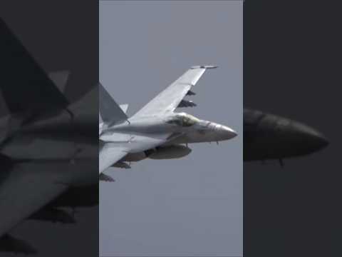 Is this the movie TOP GUN? No! Amazing footage of a real U.S. Naval F/A-18 flying through a valley!