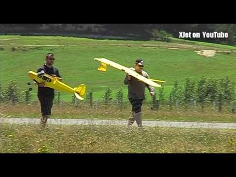 RC Piper Cub model airplane versus fence - UCQ2sg7vS7JkxKwtZuFZzn-g