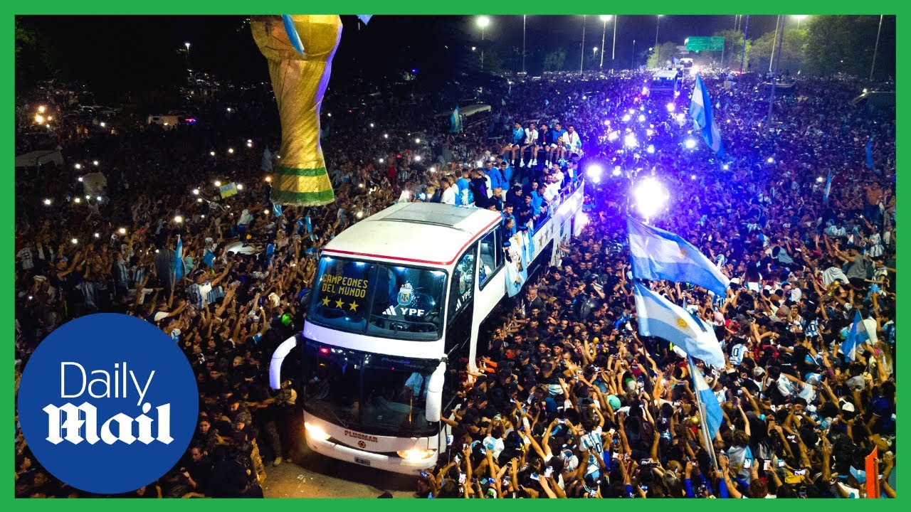 Argentina fans swarm bus carrying Lionel Messi and World Cup in Buenos Aires
