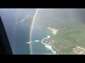 Double arc-en-ciel complet filmé par hélicoptère