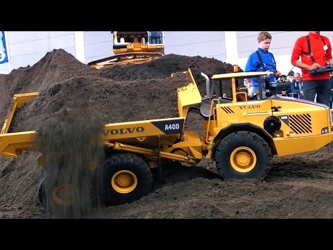 XXL RC CONSTRUCTION SITE BIG SCALE MODEL DUMP TRUCKS AND EXCAVATOR IN ACTION AMAZING !!! - UCH6AYUbtonG7OTskda1_slQ