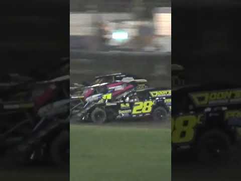 Three-wide modified racing at Wilmot Raceway. - dirt track racing video image