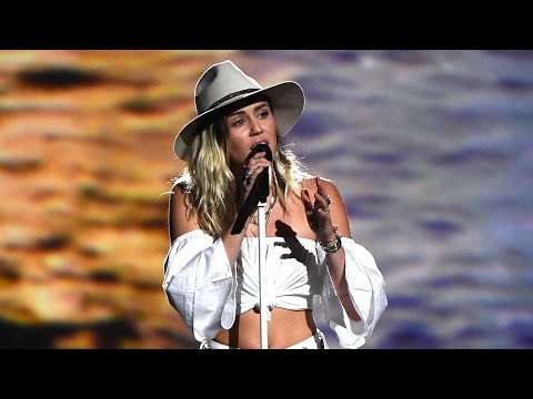 Watch Miley Cyrus Tear Up While Singing 'Malibu' at 2017 Billboard Music Awards - UCdtXPiqI2cLorKaPrfpKc4g