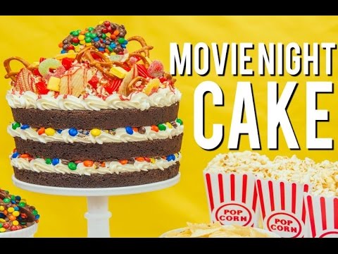 How To Make A MOVIE NIGHT CAKE! Root beer chocolate cake, vanilla buttercream, M&Ms and popcorn! - UCvM1hVcRJmVWDtATYarC0KA