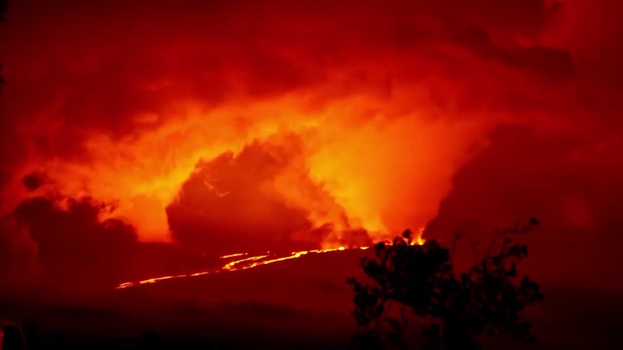 Spectators look on as Hawaii’s Mauna Loa erupts